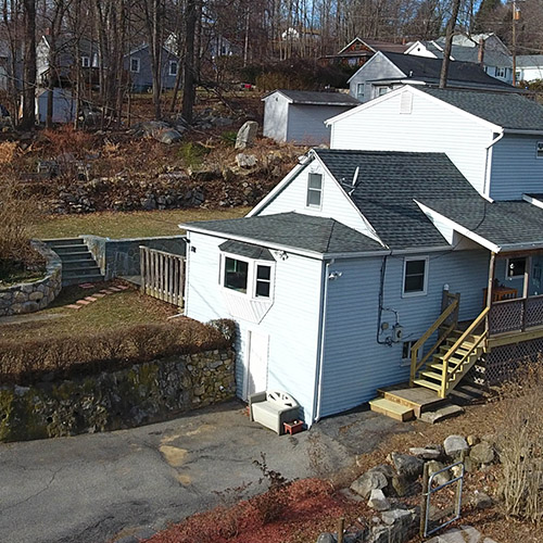 view of lakefront cottage